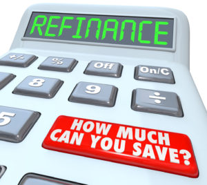 The word Refinance on the display of a digital calculator with a big red button reading How Much Can You Save on your house or mortgage payment